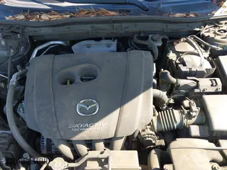 2016 Mazda Mazda3 i Grand Touring with VIN JM1BM1N74G1333699, listed as a IAAI auction lot 41836178 with 194,946 mi miles. Bid and sale history available at carsss.com. Image 10.