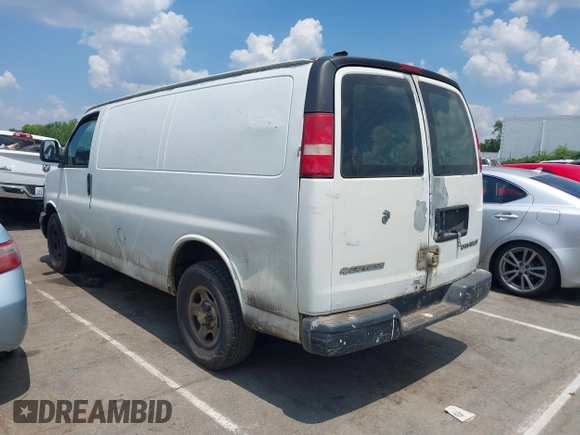 2003 Chevrolet Express Cargo with VIN 1GCFG15X731132818, listed as a IAAI auction lot 42668266 with 473,429 mi miles and . Bid and sale history available at DreamBid. Image 3.