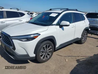 2022 Toyota Corolla Cross XLE with VIN 7MUEAAAG4NV027314, listed as a IAAI auction lot 42701907 with 30,275 mi miles and . Bid and sale history available at DreamBid. Image 2.