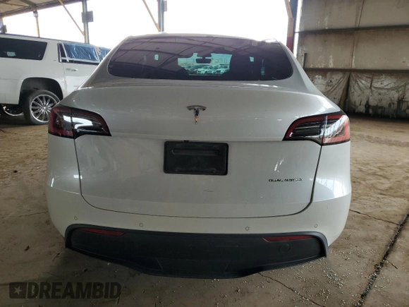 2021 Tesla Model Y Long Range with VIN 5YJYGDEE6MF075819, listed as a Copart auction lot 50903425 with 67,857 mi miles and Salvage Title. Bid and sale history available at DreamBid. Image 6.