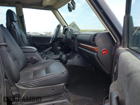 2004 Land Rover Discovery SE with VIN SALTW19464A860565, listed as a IAAI auction lot 42019860 with 153,274 mi miles. Bid and sale history available at carsss.com. Image 5.