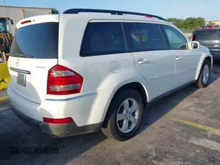 2007 Mercedes-Benz GL-Class with VIN 4JGBF71E77A210198, listed as a IAAI auction lot 42020424 with 104,729 mi miles. Bid and sale history available at carsss.com. Image 4.