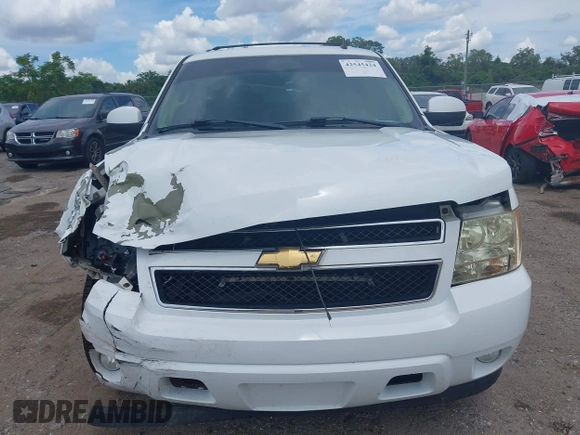 2007 Chevrolet Tahoe LTZ with VIN 1GNFC13J47J336516, listed as a IAAI auction lot 42545424 with 211,669 mi miles and . Bid and sale history available at DreamBid. Image 12.