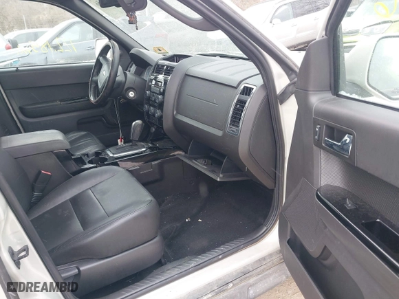 2009 Ford Escape Limited with VIN 1FMCU047X9KC30599, listed as a IAAI auction lot 41375656 with 122,185 mi miles. Bid and sale history available at carsss.com. Image 5.
