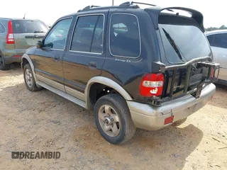 2000 Kia Sportage with VIN KNDJB7236Y5685392, listed as a IAAI auction lot 41785012 with 183,445 mi miles. Bid and sale history available at carsss.com. Image 3.