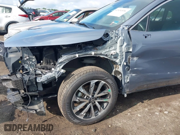 2022 Toyota Corolla Cross XLE with VIN 7MUEAABG1NV038625, listed as a IAAI auction lot 42434536 with 47,983 mi miles and . Bid and sale history available at DreamBid. Image 20.