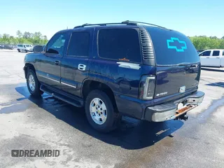 2004 Chevrolet Tahoe LT with VIN 1GNEC13Z44J125913, listed as a IAAI auction lot 42027889 with 205,796 mi miles. Bid and sale history available at carsss.com. Image 3.