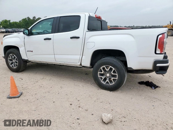 2022 GMC Canyon 4WD AT4 z VIN 1GTG6FEN2N1210072, wystawiony jako Copart lot #57084565 z przebiegiem 64 897 mil mil oraz Szkoda całkowita • Salvage title. Historia ofert i sprzedaży dostępna na DreamBid. Obrazek 2.