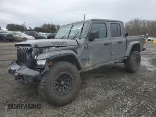 2021 Jeep Gladiator Willys with VIN 1C6HJTAG0ML603958, listed as a Copart auction lot 48033995 with 31,351 mi miles and Salvage Title. Bid and sale history available at carsss.com. Image 1.