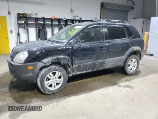 2006 Hyundai Tucson GLS with VIN KM8JN72D36U453993, listed as a Copart auction lot 42436015 with 128,270 mi miles and Salvage Title. Bid and sale history available at carsss.com. Image 1.