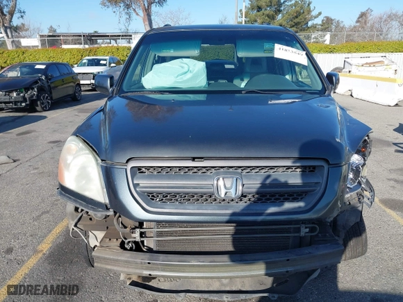 2003 Honda Pilot EX with VIN 2HKYF18633H599550, listed as a IAAI auction lot 41813549 with 242,103 mi miles. Bid and sale history available at carsss.com. Image 13.