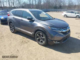 2019 Honda CR-V Touring with VIN 7FARW1H98KE007592, listed as a IAAI auction lot 41711030 with 58,118 mi miles. Bid and sale history available at carsss.com. Image 1.