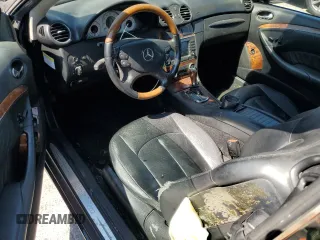 2006 Mercedes-Benz CLK-Class 5.0L with VIN WDBTK75G96T063299, listed as a Copart auction lot 69882884 with 148,934 mi miles and Salvage Title. Bid and sale history available at carsss.com. Image 8.
