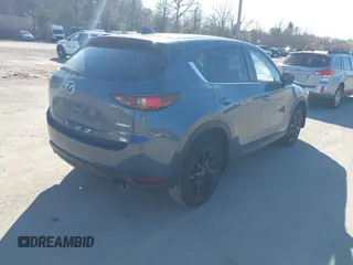 2021 Mazda CX-5 Touring with VIN JM3KFBCM0M0489644, listed as a IAAI auction lot 41756117 with 67,365 mi miles. Bid and sale history available at carsss.com. Image 4.