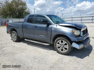 2007 Toyota Tundra SR5 with VIN 5TFRV541X7X025112, listed as a Copart auction lot 69796584 with 327,475 mi miles and Salvage Title. Bid and sale history available at carsss.com. Image 4.