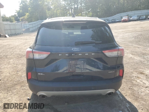 2021 Ford Escape SEL Hybrid z VIN 1FMCU9CZ7MUA94260, wystawiony jako Copart lot #71013514 z przebiegiem Nie podano mil oraz Szkoda całkowita • Salvage title. Historia ofert i sprzedaży dostępna na DreamBid. Obrazek 6.