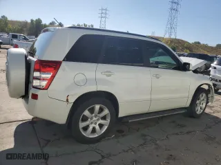 2012 Suzuki Grand Vitara Limited with VIN JS3TD0D71C4101457, listed as a Copart auction lot 73039304 with 138,064 mi miles and Salvage Title. Bid and sale history available at carsss.com. Image 3.