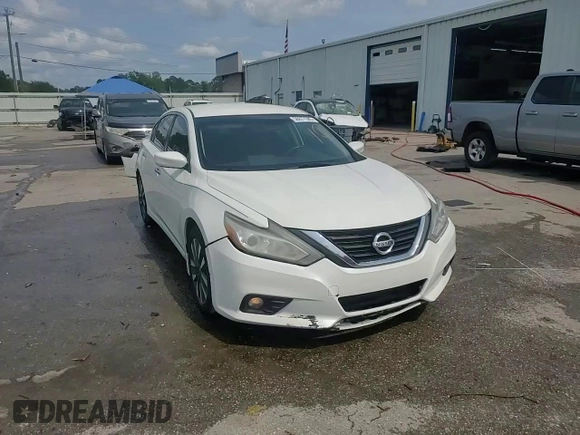 2017 Nissan Altima SV with VIN 1N4AL3AP4HC182164, listed as a Copart auction lot 56977385 with 154,958 mi miles and Salvage title. Bid and sale history available at DreamBid. Image 14.