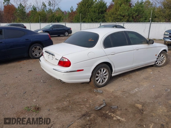 2002 Jaguar S-Type with VIN SAJDA01P12GM35163, listed as a IAAI auction lot 41097415 with 114,017 mi miles and . Bid and sale history available at DreamBid. Image 4.