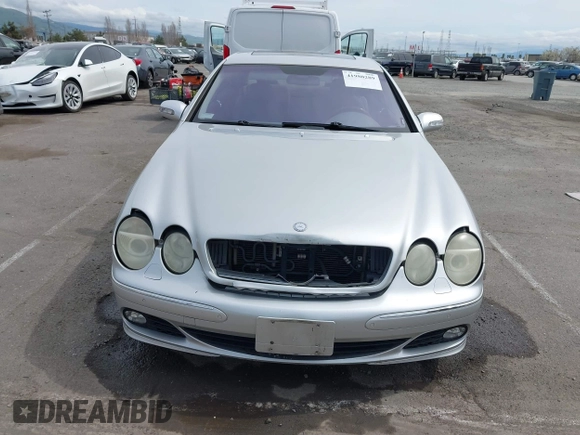 2003 Mercedes-Benz CL 5.0L with VIN WDBPJ75J23A033309, listed as a IAAI auction lot 41980289 with 174,484 mi miles. Bid and sale history available at carsss.com. Image 12.