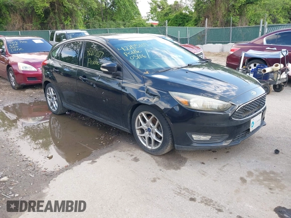 2015 Ford Focus SE with VIN 1FADP3K2XFL319559, listed as a IAAI auction lot 42205107 with 184,499 mi miles. Bid and sale history available at carsss.com. Image 1.