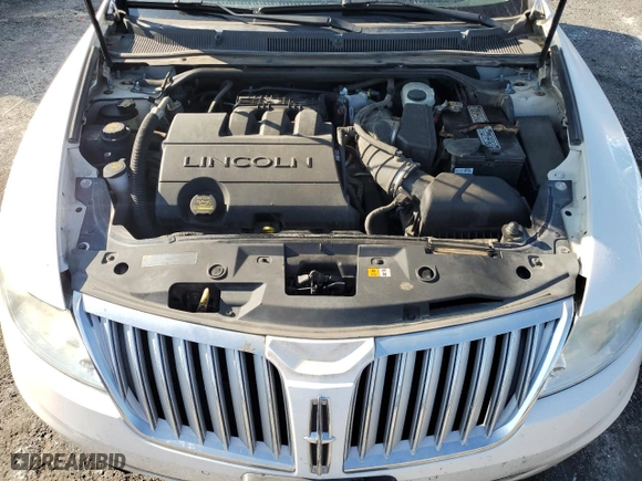 2012 Lincoln MKS with VIN 1LNHL9DR0CG802997, listed as a Copart auction lot 72217704 with 186,296 mi miles and Salvage Title. Bid and sale history available at carsss.com. Image 11.