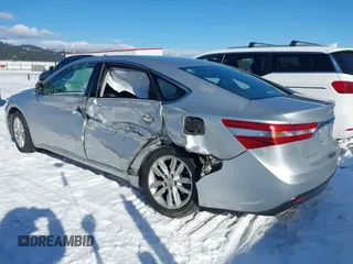 2013 Toyota Avalon XLE with VIN 4T1BK1EBXDU009947, listed as a IAAI auction lot 41562857 with 174,764 mi miles and . Bid and sale history available at DreamBid. Image 3.