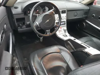 2004 Chrysler Crossfire z VIN 1C3AN69L64X014217, wystawiony jako Copart lot #82427704 z przebiegiem 85 328 mil mil oraz Szkody całkowita. Historia ofert i sprzedaży dostępna na DreamBid. Obrazek 8.