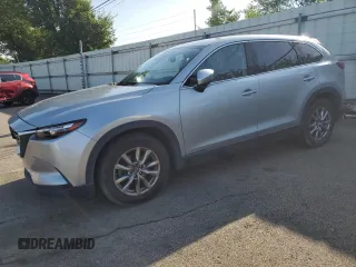 2018 Mazda CX-9 Touring z VIN JM3TCACY4J0219449, wystawiony jako Copart lot #61949725 z przebiegiem 134 904 mil mil oraz Czysty tytuł • Clean title. Historia ofert i sprzedaży dostępna na DreamBid. Obrazek 1.