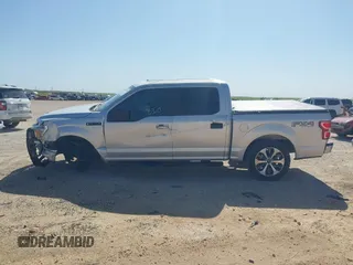 2019 Ford F-150 XL with VIN 1FTEW1E50KKF27106, listed as a IAAI auction lot 41997829 with 88,187 mi miles and . Bid and sale history available at DreamBid. Image 14.