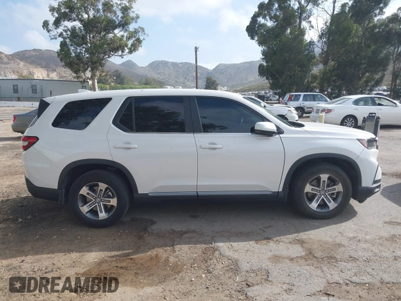 2023 Honda Pilot EX-L z VIN 5FNYG2H47PB015673, wystawiony jako IAAI lot #42192426 z przebiegiem 22 617 mil mil oraz . Historia ofert i sprzedaży dostępna na DreamBid. Obrazek 14.