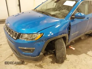 2018 Jeep Compass Altitude with VIN 3C4NJDBB5JT345165, listed as a IAAI auction lot 41618844 with 66,226 mi miles and . Bid and sale history available at carsss.com. Image 6.