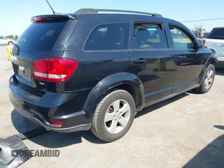 2012 Dodge Journey SXT with VIN 3C4PDDBG0CT300469, listed as a IAAI auction lot 42467233 with 127,420 mi miles and . Bid and sale history available at DreamBid. Image 4.