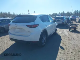 2019 Mazda CX-5 Grand Touring with VIN JM3KFBDM2K0672720, listed as a IAAI auction lot 41751196 with 51,632 mi miles and . Bid and sale history available at carsss.com. Image 4.
