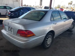 1998 Acura RL с VIN JH4KA9666WC006008, выставлен на аукционе IAAI как лот 41675045 с пробегом 232 087 миль миль и . История ставок и продаж доступна на DreamBid. Изображение 4.