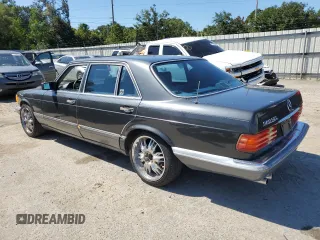1989 Mercedes-Benz 560 with VIN WDBCA39E0KA485343, listed as a Copart auction lot 71889544 with 201,385 mi miles and Non Repairable. Bid and sale history available at DreamBid. Image 2.