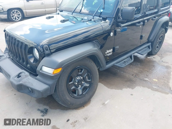 2019 Jeep Wrangler Unlimited Sport S with VIN 1C4HJXDG9KW653488, listed as a IAAI auction lot 42275297 with Not provided miles and . Bid and sale history available at DreamBid. Image 18.