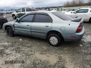 1995 Honda Accord LX with VIN JHMCD5632SC061723, listed as a Copart auction lot 79943104 with 251,242 mi miles and Salvage Title. Bid and sale history available at carsss.com. Image 2.