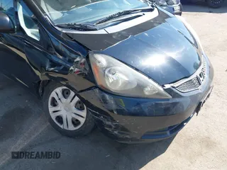 2010 Honda Fit with VIN JHMGE8H28AS012129, listed as a IAAI auction lot 41980485 with 144,170 mi miles. Bid and sale history available at carsss.com. Image 6.