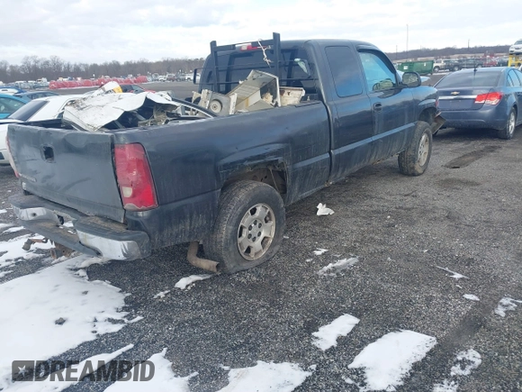 2003 Chevrolet Silverado 1500 LS with VIN 2GCEK19VX31260807, listed as a IAAI auction lot 41443970 with 180,000 mi miles. Bid and sale history available at carsss.com. Image 4.