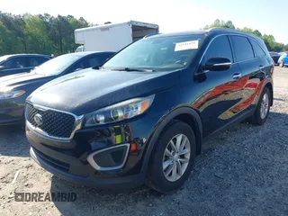 2016 Kia Sorento LX with VIN 5XYPG4A36GG170121, listed as a IAAI auction lot 41941691 with 240,609 mi miles and . Bid and sale history available at carsss.com. Image 17.