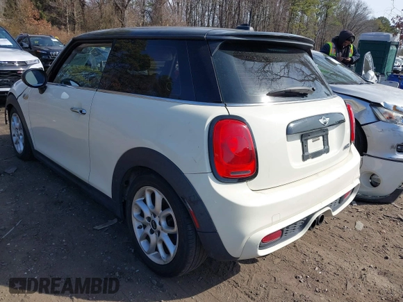 2014 MINI Hardtop S with VIN WMWXM7C57ET987122, listed as a IAAI auction lot 41780127 with 78,567 mi miles and . Bid and sale history available at DreamBid. Image 3.