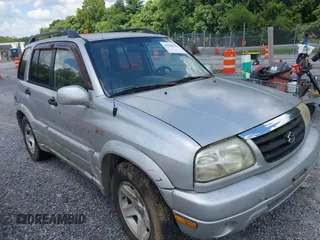 2003 Suzuki Grand Vitara z VIN JS3TD62V634102107, wystawiony jako IAAI lot #42846302 z przebiegiem 165 041 mil mil oraz . Historia ofert i sprzedaży dostępna na DreamBid. Obrazek 1.