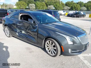 2016 Cadillac ATS Coupe Luxury Collection AWD with VIN 1G6AH1RX6G0109787, listed as a IAAI auction lot 41151839 with 71,573 mi miles. Bid and sale history available at carsss.com. Image 1.