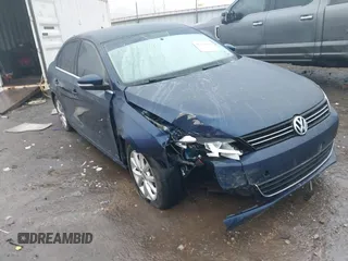 2013 Volkswagen Jetta SE z VIN 3VWDX7AJ3DM267839, wystawiony jako IAAI lot #41157583 z przebiegiem 61 643 mil mil oraz . Historia ofert i sprzedaży dostępna na DreamBid. Obrazek 1.