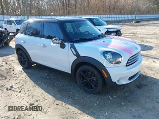 2012 MINI Countryman with VIN WMWZB3C50CWM30524, listed as a IAAI auction lot 41623400 with 194,858 mi miles and . Bid and sale history available at DreamBid. Image 1.