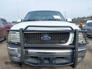 2003 Ford F-150 XLT with VIN 1FTRW08L73KA73945, listed as a IAAI auction lot 41474904 with 122,080 mi miles. Bid and sale history available at carsss.com. Image 13.
