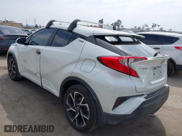 2019 Toyota C-HR XLE with VIN JTNKHMBX9K1054053, listed as a IAAI auction lot 42120256 with 67,083 mi miles and . Bid and sale history available at DreamBid. Image 3.