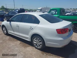 2014 Volkswagen Jetta Sedan SE with VIN 3VWD07AJ2EM310654, listed as a IAAI auction lot 41997453 with 126,801 mi miles. Bid and sale history available at carsss.com. Image 3.