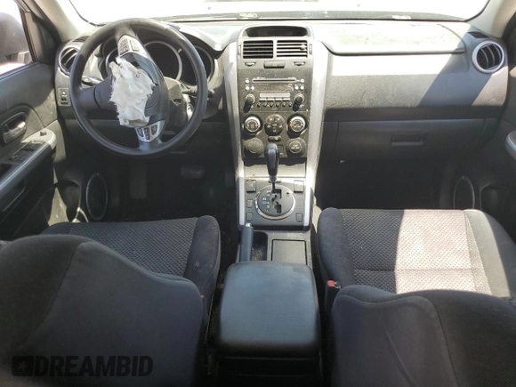 2006 Suzuki Grand Vitara Premium with VIN JS3TD943964102832, listed as a Copart auction lot 59971694 with 148,329 mi miles and Salvage title. Bid and sale history available at DreamBid. Image 8.